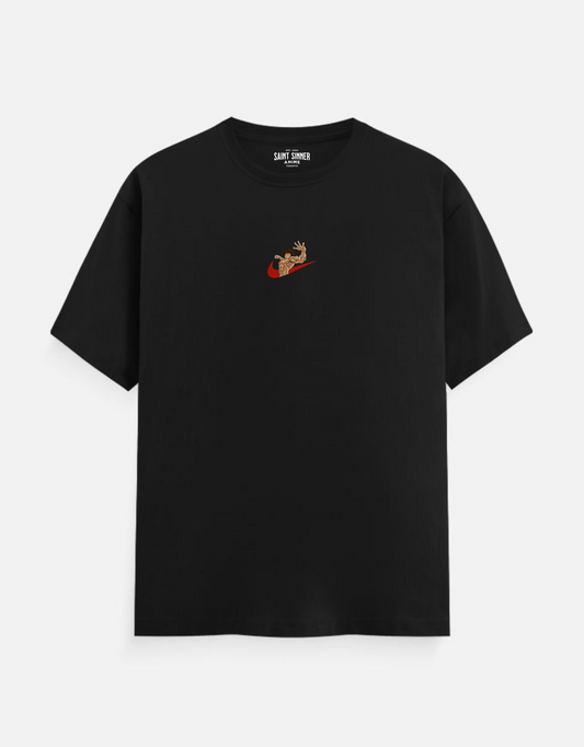 Black t-shirt with a small embroidered design on a white background